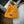 Load image into Gallery viewer, Nomad Waffle Knit Beanie in Marigold. Small black tag on front of the beanie reads "Upstate of Mind".