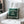 Load image into Gallery viewer, Upstate of Mind Handmade Hooked Wool Decor Pillow made by Chandler4Corners. Pillow is sitting on the corner of a beige white cozy chair in a minimalist living room.