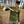 Load image into Gallery viewer, A model wearing the Forest Ranger Long Sleeve Tee while holding a Star Wars ship.