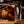 Load image into Gallery viewer, A lifestyle photo for our Troy New York - Golden Pilsner Glass. Glass is clear with "Upstate of Mind" text on the front.