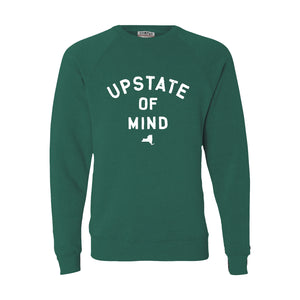 Upstate of Mind Crewneck - Moss Heather. The Upstate of Mind Crewneck is a super soft polyester/cotton blend fleece. We used the finest inks for soft cozy feel on this graphic fleece. Features text that reads "Upstate of Mind" with a small silhouette of New York State underneath.